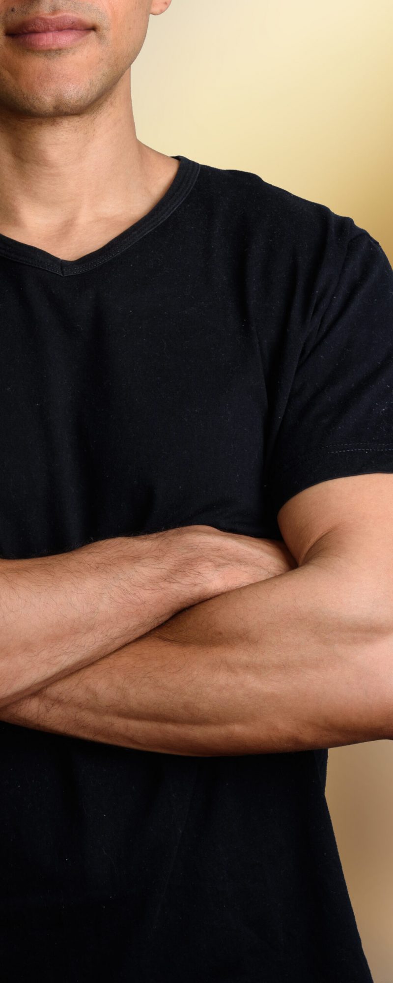 Studio shot of mature handsome bald man against gray background horizontal shot